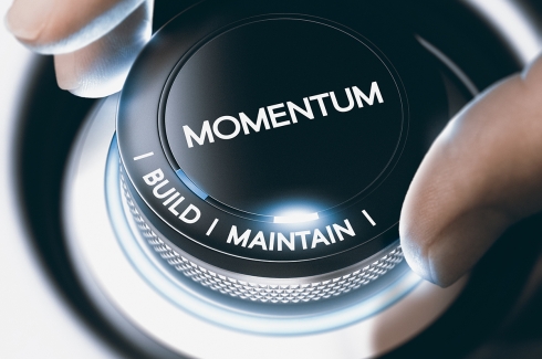 Dial saying "momentum"