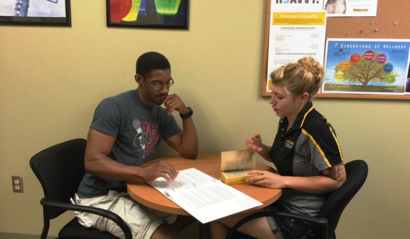 Two people studying at a table