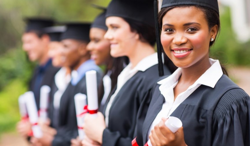 Graduates with diplomas 