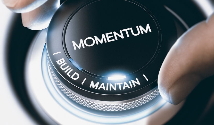 Dial saying "momentum"