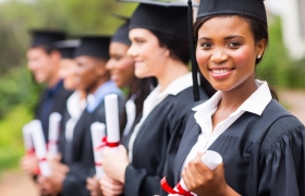 Graduates with diplomas 